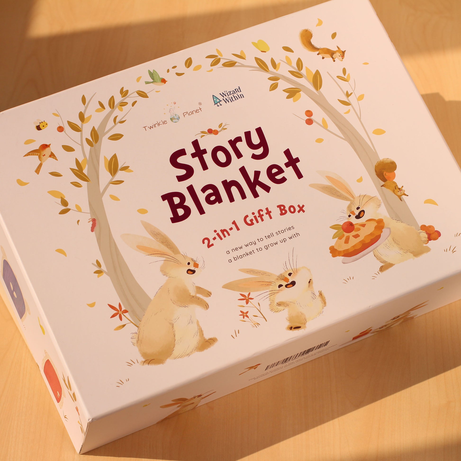 Twinkle Planet x Wizard Within Story Blanket 2-in-1 Gift Set Box with cartoon animals on a hard paperback  box.